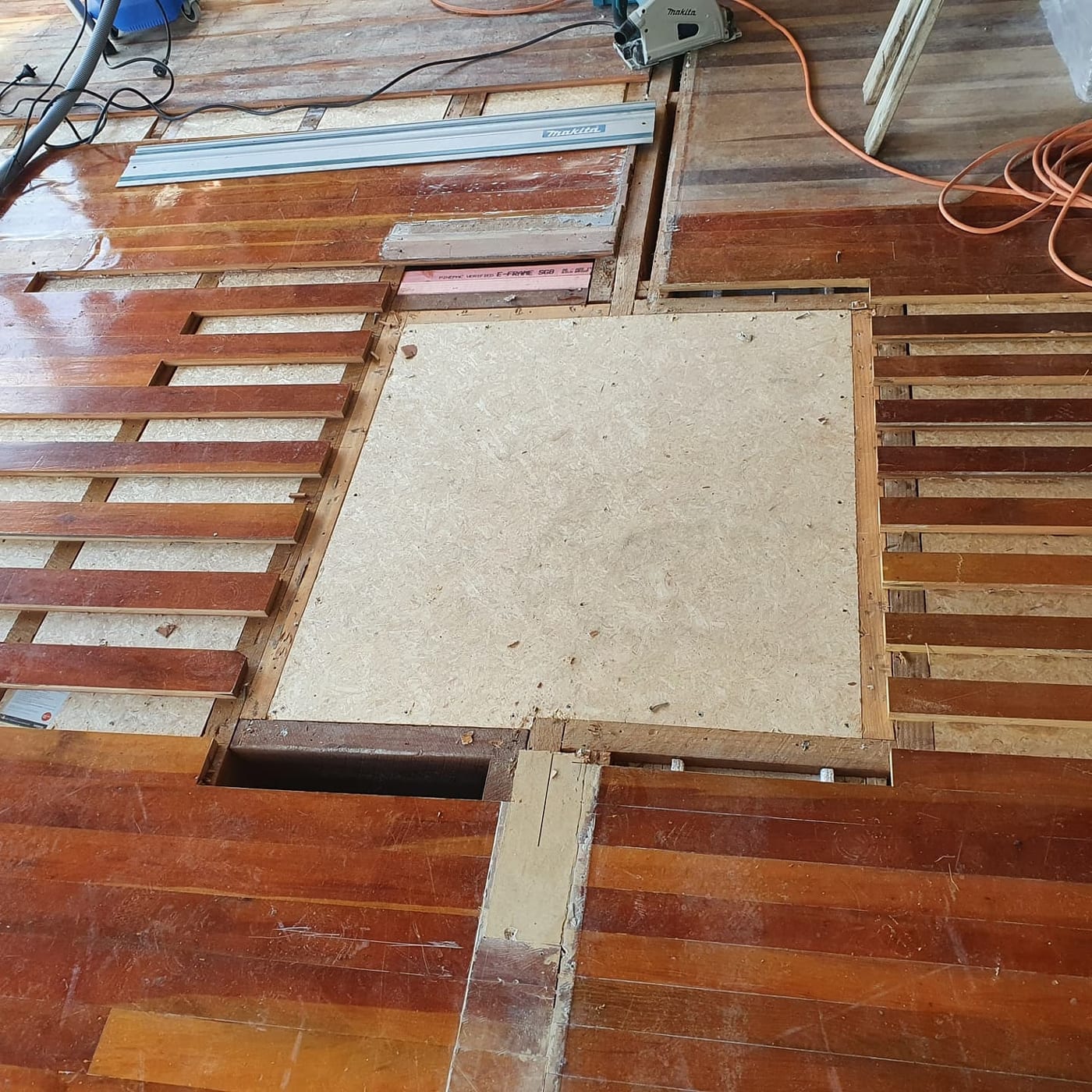 Patched timber flooring detail