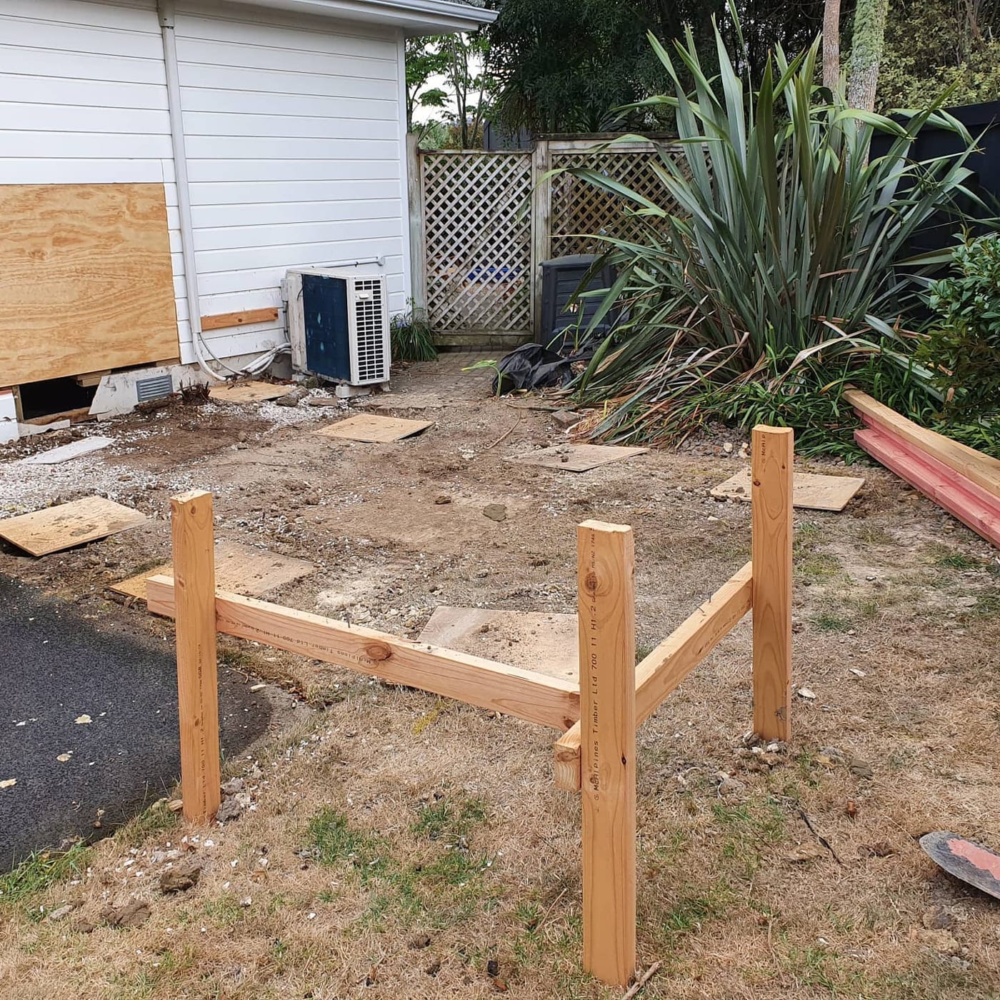 Rusticated pine weatherboard office extension