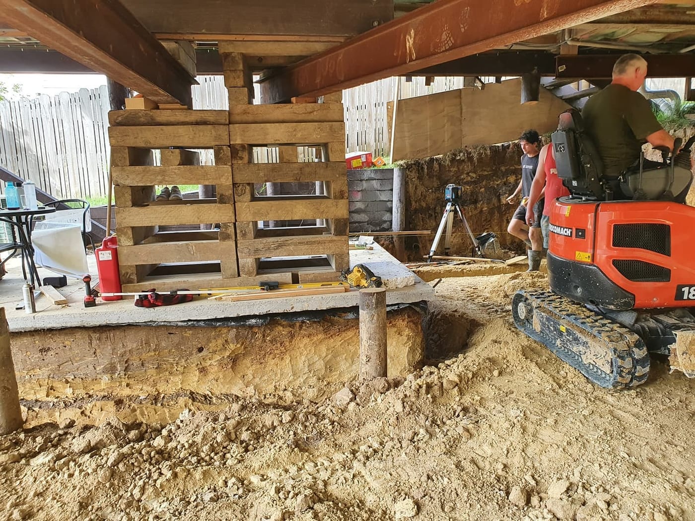 Underhouse excavation for an added dwelling