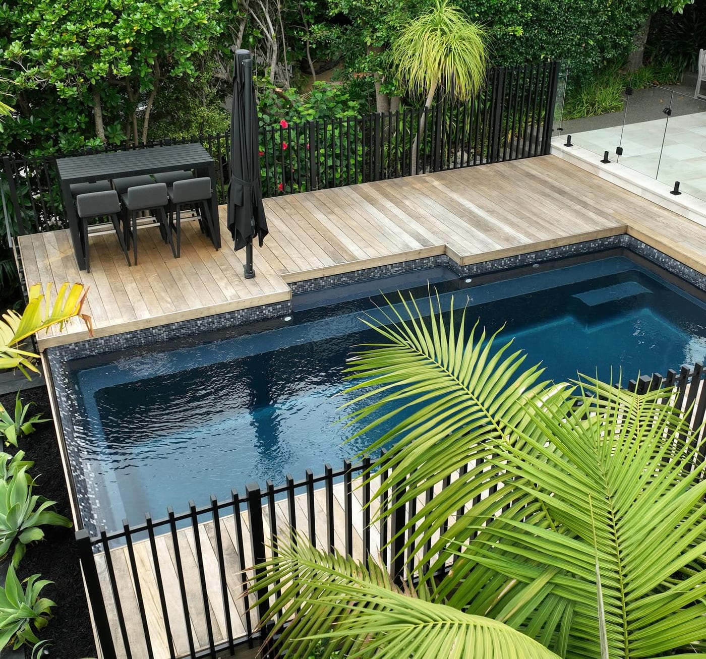 Completed poolside outdoor living area